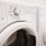 close up of washer/dryer units in apartment