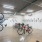 large bicycle storage room with wall mounted racks and floor stands